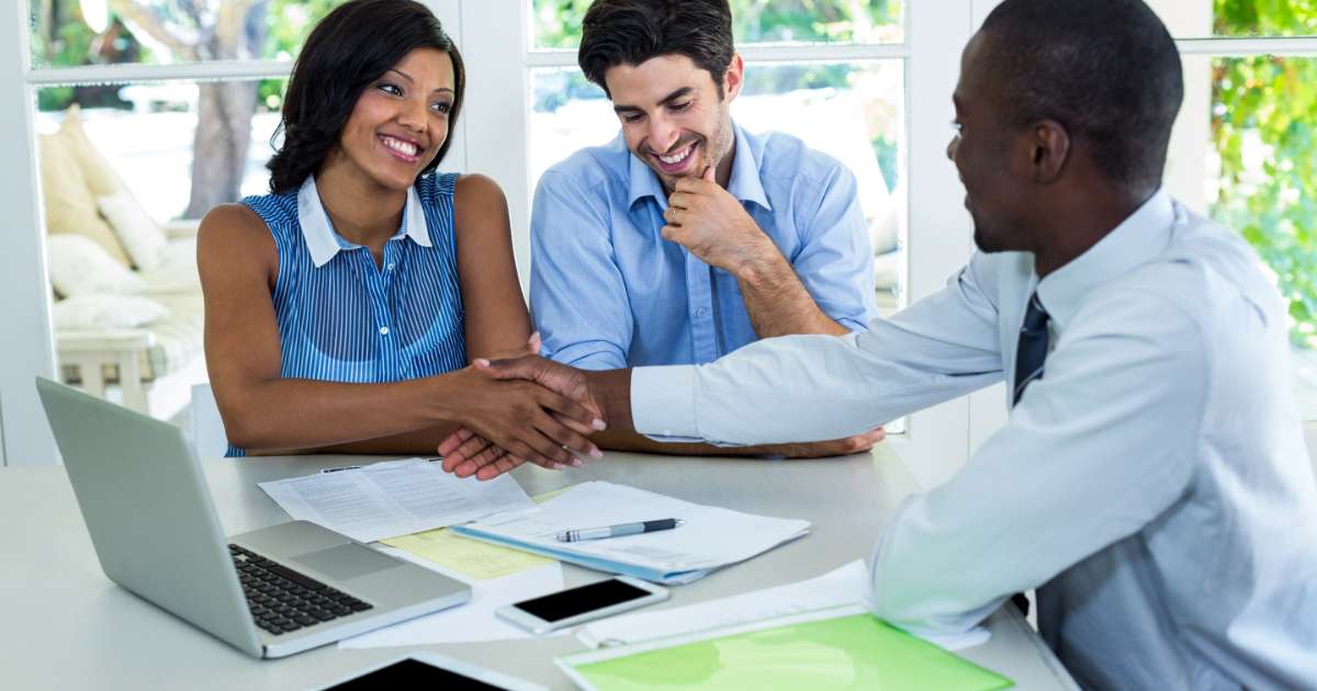 couple talking to off-market home buyer